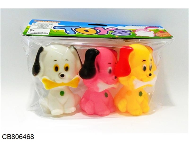 Three rubber-enameled dogs